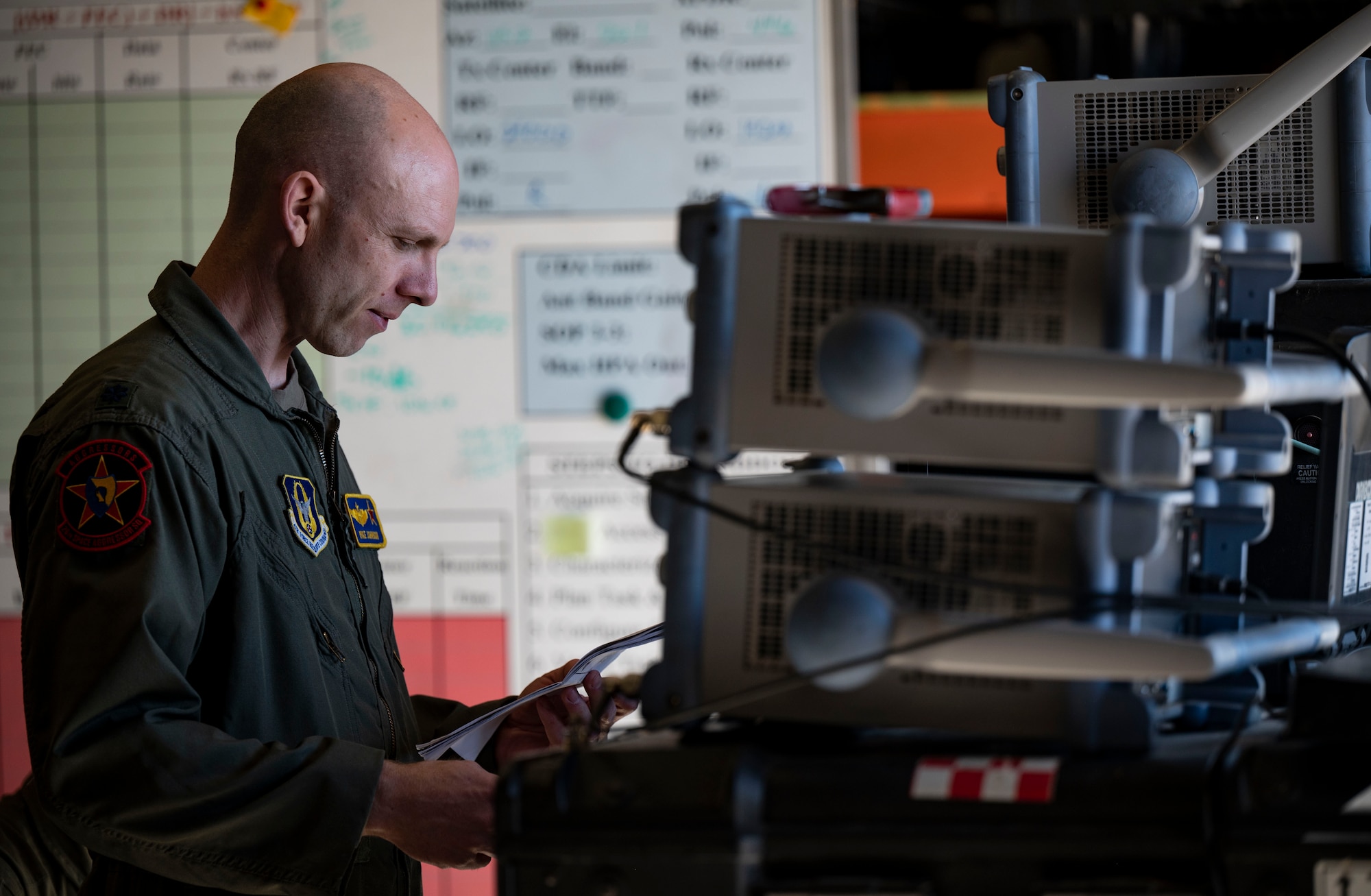 U.S. Air Force Lt. Col. Mike Johnson, 26th Space Aggressor Squadron space control operator, builds a satellite signal during a CRIMSON SKIES exercise