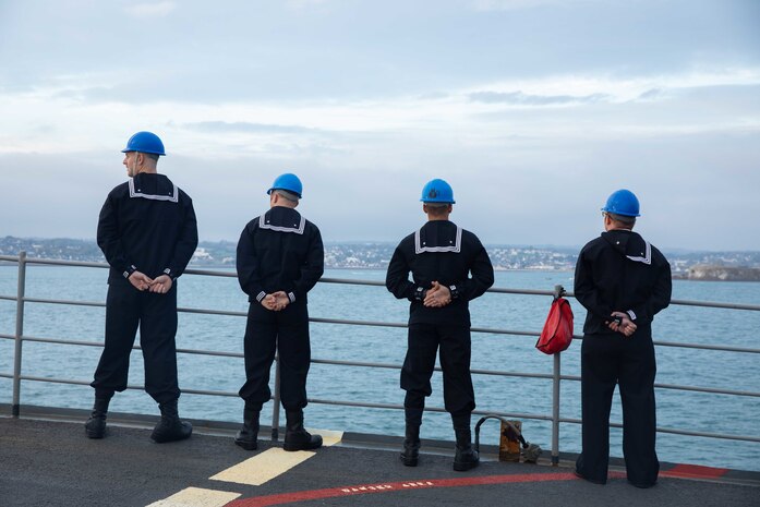 Sailors man the rails on the Ticonderoga-class guided-missile cruiser USS Normandy (CG 60) as the ship pulls into its namesake region of France while underway as part of the Gerald R. Ford Carrier Strike Group, Nov. 14, 2022. The first-in-class aircraft carrier USS Gerald R. Ford (CVN 78) is on its inaugural deployment conducting training and operations alongside NATO Allies and partners to enhance integration for future operations and demonstrate the U.S. Navy’s commitment to a peaceful, stable and conflict-free Atlantic region. (U.S. Navy photo by Mass Communication Specialist 2nd Class Malachi Lakey)