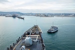 The Ticonderoga-class guided-missile cruiser USS Normandy (CG 60) pulls into its namesake region of Fance while underway as part of the Gerald R. Ford Carrier Strike Group, Nov. 14, 2022. The first-in-class aircraft carrier USS Gerald R. Ford (CVN 78) is on its inaugural deployment conducting training and operations alongside NATO Allies and partners to enhance integration for future operations and demonstrate the U.S. Navy’s commitment to a peaceful, stable and conflict-free Atlantic region. (U.S. Navy photo by Mass Communication Specialist 2nd Class Malachi Lakey)