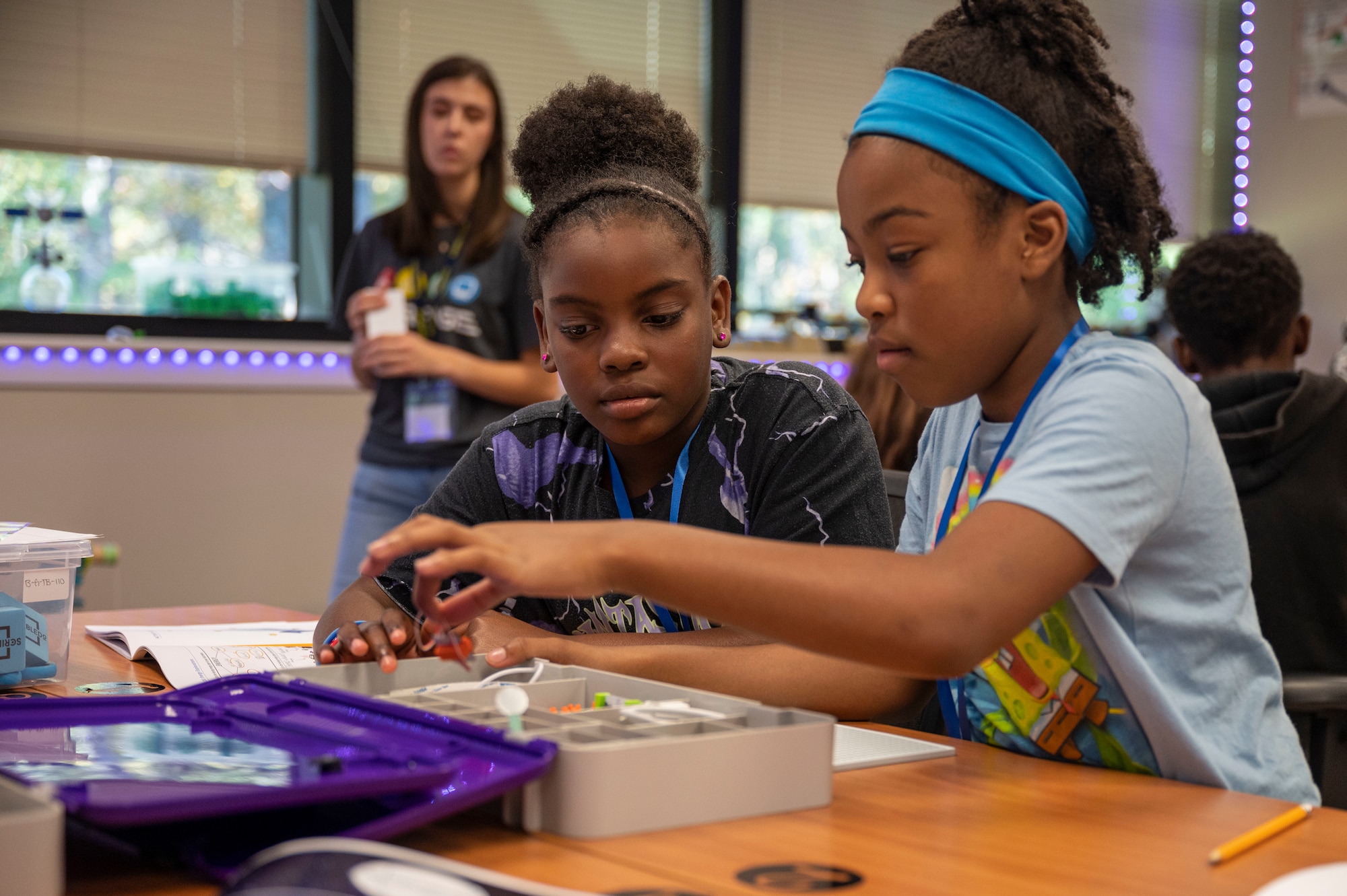 Students experiment with an electronic building kit