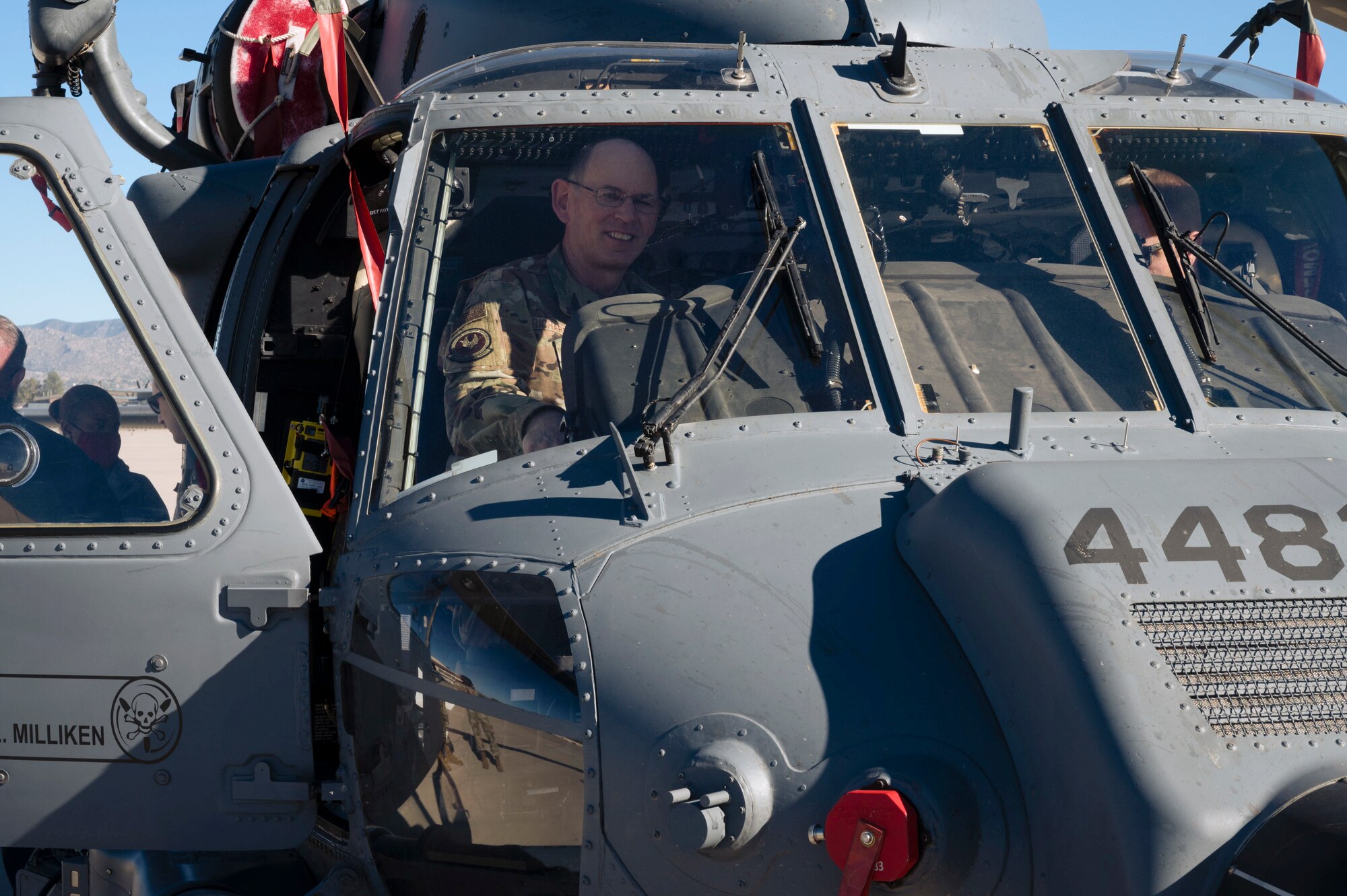 A man sits in an aircraft.