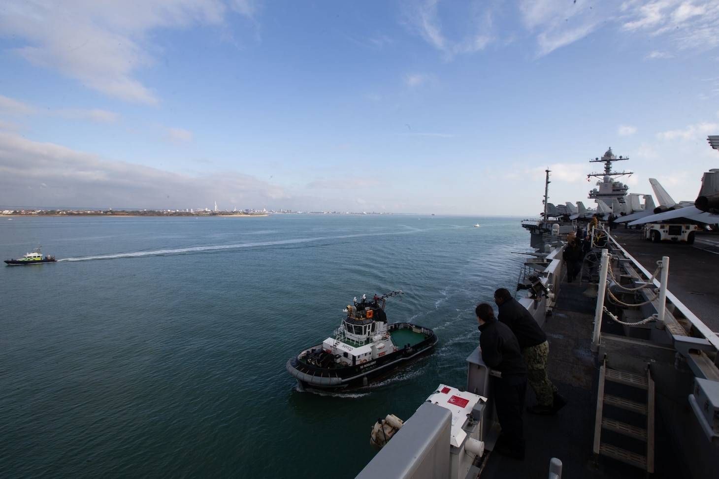 Sailors assigned to the first-in-class aircraft carrier USS Gerald R. Ford (CVN 78) observe as the ship transits to Portsmouth, England, for the ship’s second international port visit, Nov. 14, 2022. The Gerald R. Ford Strike Group is conducting their first deployment in the U.S. Naval Forces Europe area of operations. (U.S. Navy photo by Mass Communication Specialist 2nd Class Zack Guth)