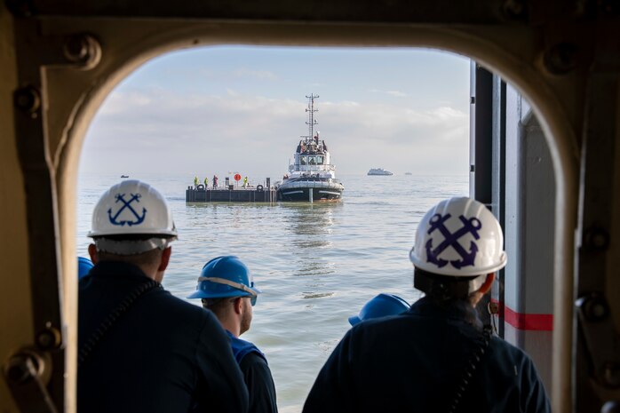 Sailors assigned to the-first-in-class aircraft carrier USS Gerald R. Ford’s (CVN 78) deck department, prepare to dock with an approaching barge during a visit to Portsmouth, England, Nov. 14, 2022. The Gerald R. Ford Carrier Strike Group (GRFCSG) is deployed in the Atlantic Ocean, conducting training and operations alongside NATO Allies and partners to enhance integration for future operations and demonstrate the U.S. Navy’s commitment to a peaceful, stable and conflict-free Atlantic region.