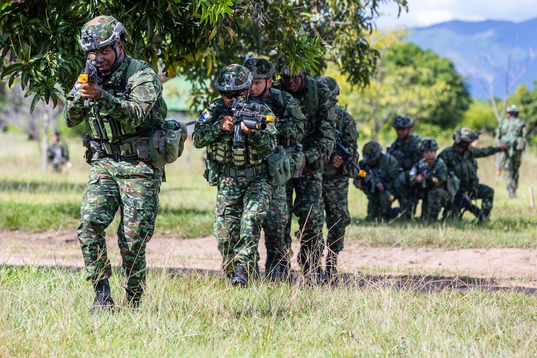 A Colombian Army infantry squad moves through a movement to contact exercise during training lanes at Exercise Southern Vanguard 23 at Tolemaida Military Base, Colombia, Nov. 12, 2022.