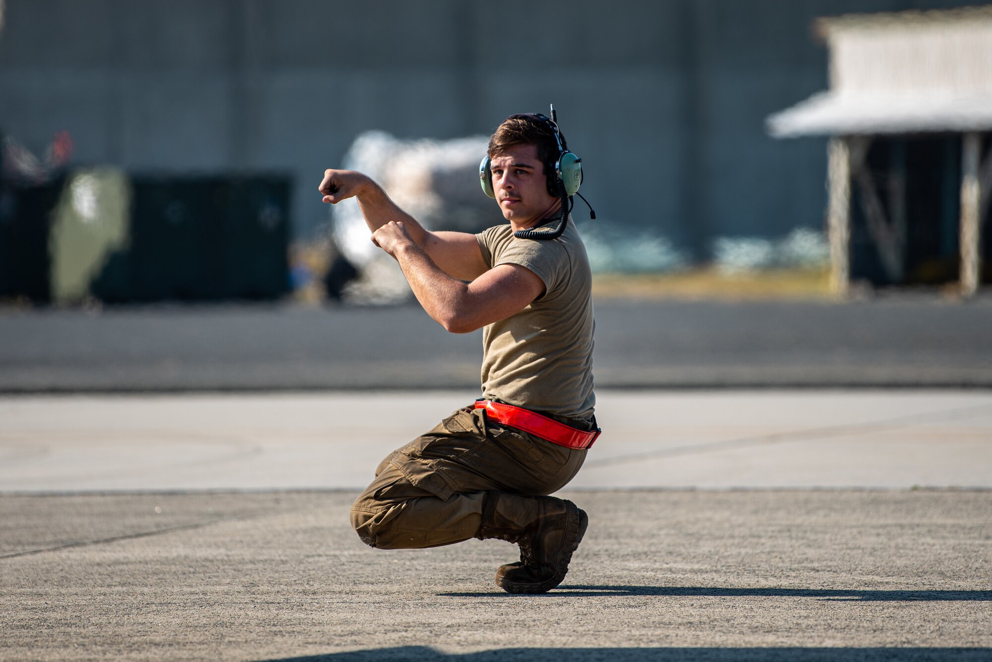 Airman conducts pre-flight checks.