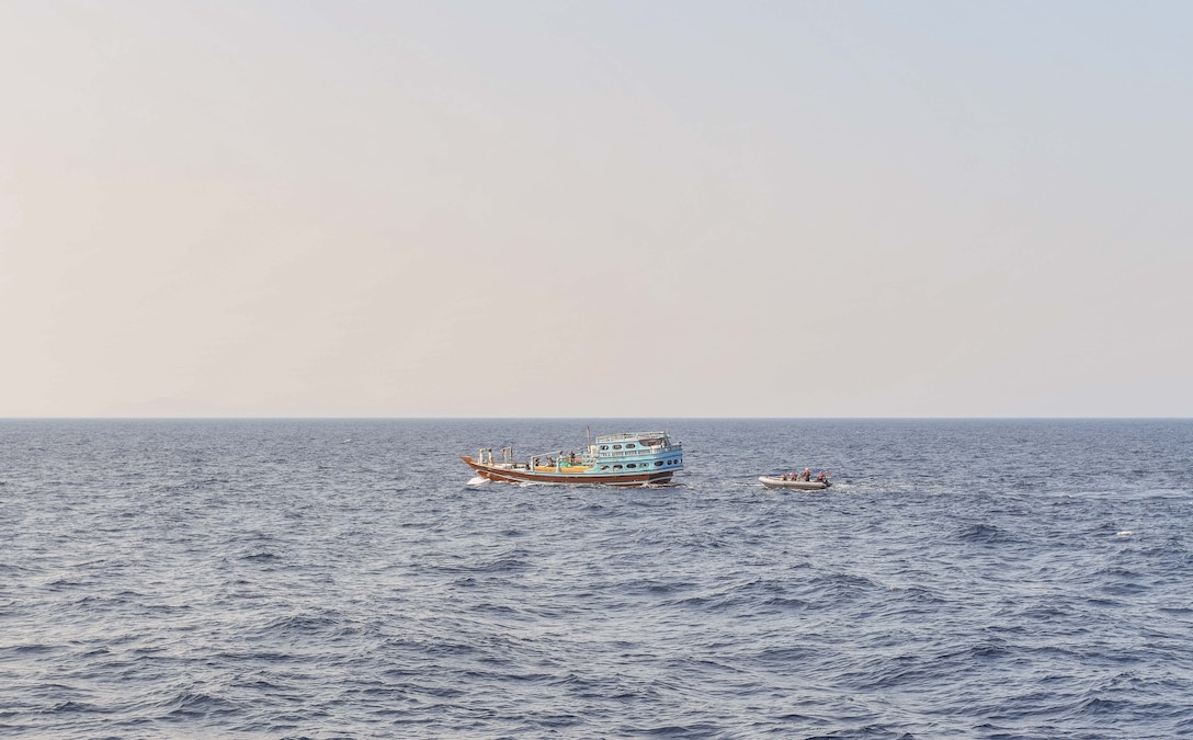 GULF OF OMAN (Nov. 8, 2022) U.S. naval forces approach a fishing vessel transiting international waters in the Gulf of Oman, Nov. 8, during an interdiction.