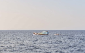 GULF OF OMAN (Nov. 8, 2022) U.S. naval forces approach a fishing vessel transiting international waters in the Gulf of Oman, Nov. 8, during an interdiction.