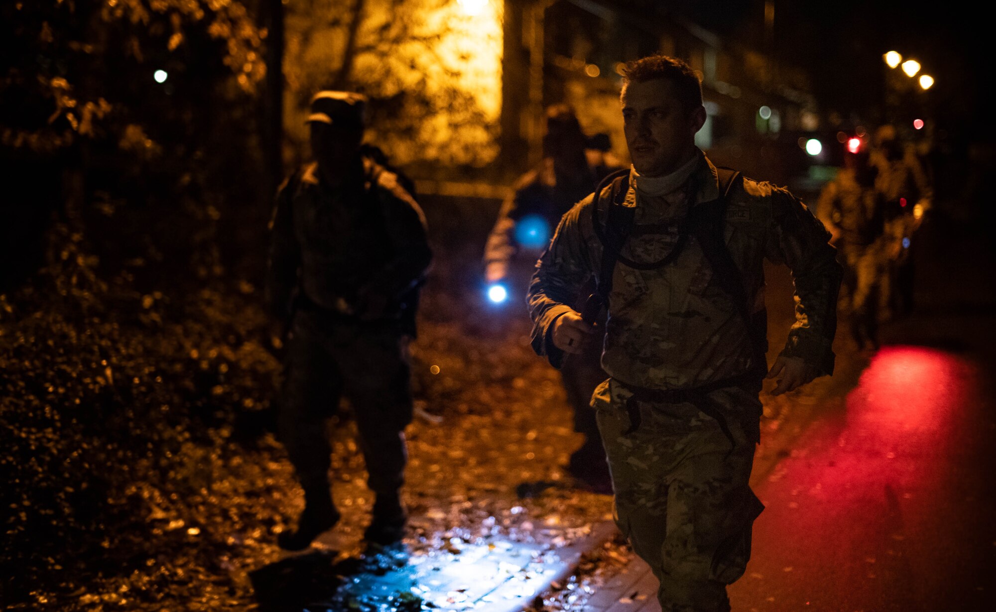 U.S. Air Force Tech. Sgt. Orest Horechyy, 21st Operational Weather Squadron shift supervisor, right, assigned to Kapaun Air Station, Germany, runs during the Norwegian Foot March at Ramstein Air Base, Germany, Nov. 5, 2022. Due to unprecedented interest by U.S. military personnel, Norwegian officials have granted a permanent virtual endorsement to enable them to participate. Since 2020, more than 16,000 Soldiers, Sailors, Marines, Airmen, Guardians, Coast Guardsmen, civilians and contractors have participated in 117 Norwegian Foot March events. (U.S. Air Force photo by Airman 1st Class Jared Lovett)