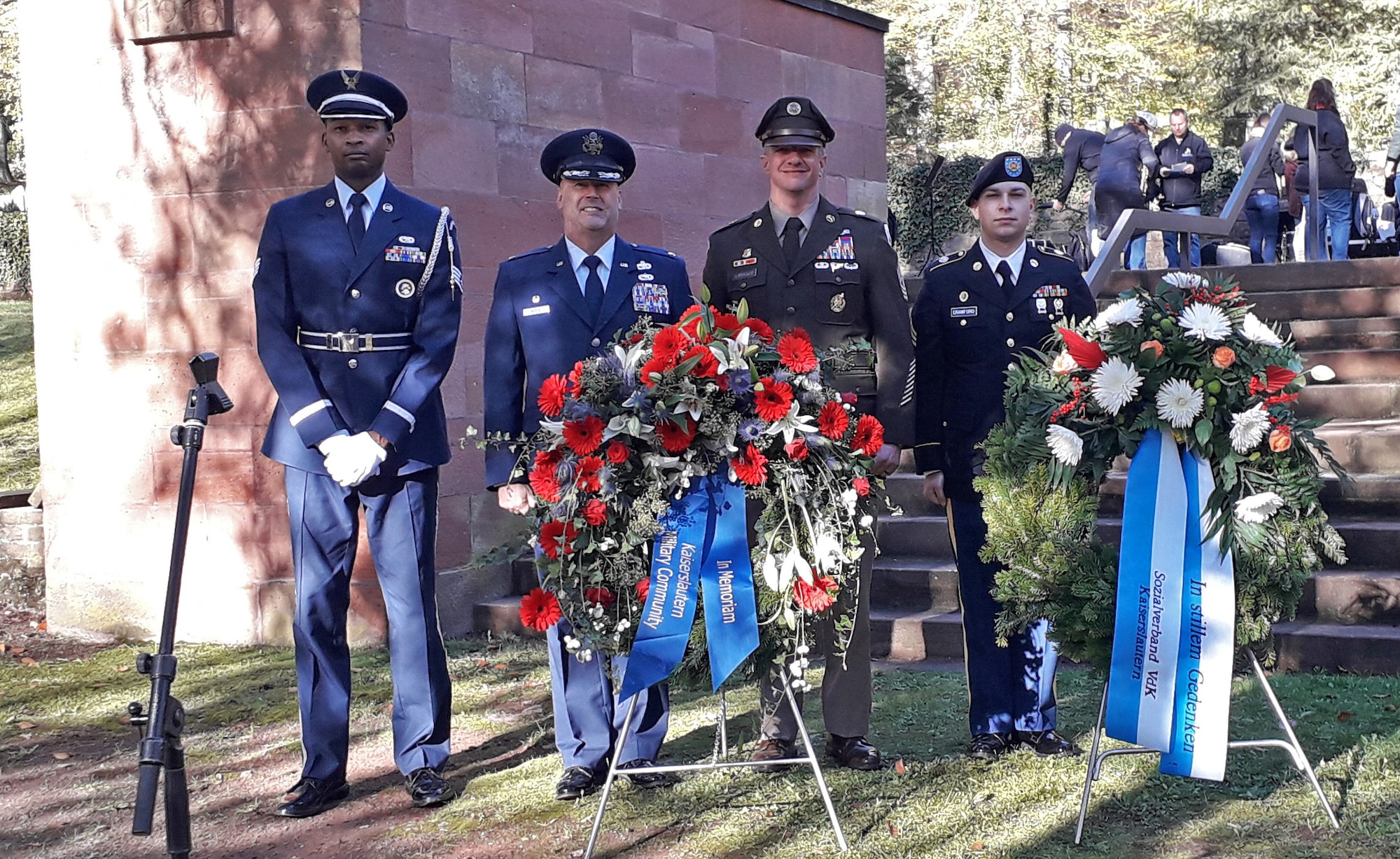 Leadership members from around the Kaiserslautern Military Community pose for a photo in Kaiserslautern, Germany, Nov. 13, 2022. The 33rd Sunday of the year or two Sundays before advent is recognized as the National Day of Mourning in Germany where people come together and remember all those who were lost during war and other tragedies across the world. (Courtesy photo)
