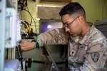 New York Army National Guard Pfc. Rafael Caballero, assigned to the 101st Signal Expeditionary Battalion, trains on the AN/TSC-156 Phoenix Tactical SHF Satellite Terminal during premobilization training at the Camp Smith Training Site in Cortlandt Manor, N.Y., Oct. 3, 2022.