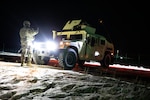 Soldiers from 113th Military Police Company, Mississippi Army National Guard, patrol the missile defense complex as part of exercise Guardian Watch 23 at Fort Greely, Alaska, Nov. 2, 2022. Guardian Watch 23 focused on ground-based midcourse defense and critical installations security, which are the two missions of the 49th Missile Defense Battalion.