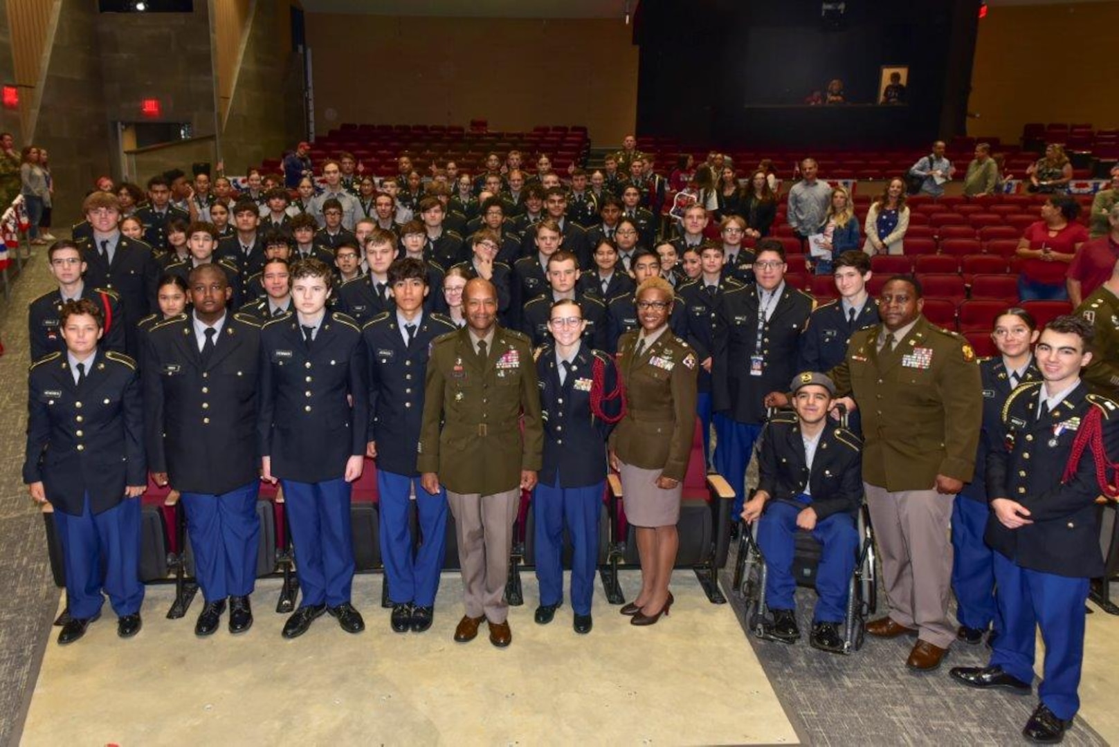 General poses with students