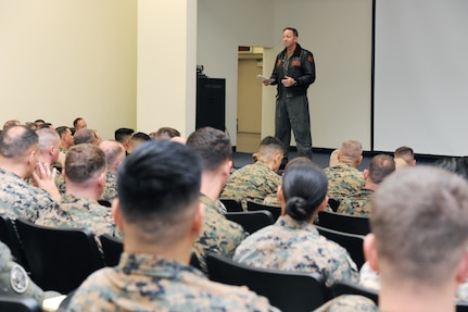 Rear Adm. Jeffrey Czerewko, commander, Carrier Strike Group 4 (CSG 4,) gives opening remarks at the Amphibious Ready Group (ARG) and Marine Expeditionary Unit (MEU) Staff Planning Course (AMSPC) hosted by Expeditionary Warfare Training Group, Atlantic (EWTGL).