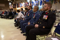 Service members, veterans, family members and distinguished guests celebrate Veterans Day by honoring those who served during the Department of Military and Veterans Affairs Veterans Day ceremony held at the National Guard Armory on Joint Base Elmendorf-Richardson, Alaska, Nov. 11, 2022. The ceremony included speeches from key speakers, Fallen Warrior ceremony, presentation of commemorative wreaths, and moment of silence for those who have fallen. (Alaska National Guard photo by Victoria Granado)