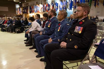 Service members, veterans, family members and distinguished guests celebrate Veterans Day by honoring those who served during the Department of Military and Veterans Affairs Veterans Day ceremony held at the National Guard Armory on Joint Base Elmendorf-Richardson, Alaska, Nov. 11, 2022. The ceremony included speeches from key speakers, Fallen Warrior ceremony, presentation of commemorative wreaths, and moment of silence for those who have fallen. (Alaska National Guard photo by Victoria Granado)