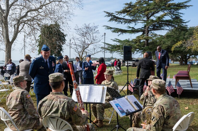 U.S. Air Force Col. Gregory Beaulieu, 633d Air Base Wing commander, visits with members of the Training and Doctrine Command Woodwind Quintet at the Hampton VA Medical Center, Virginia, Nov. 10, 2022.