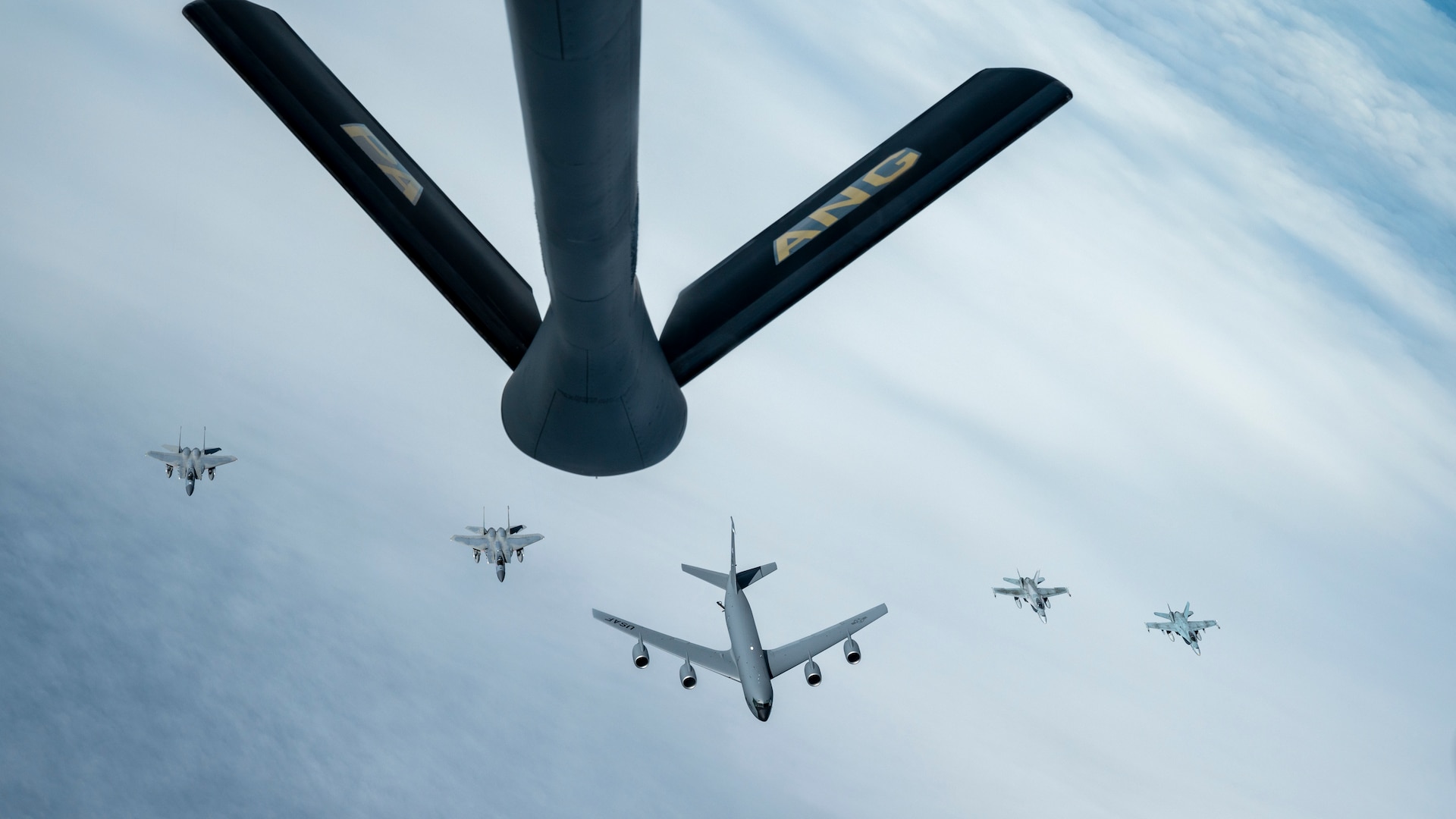 Under the direction of the North American Aerospace Defense Command , F-15s assigned to the Massachusetts Air National Guard, CF-18s assigned to the Royal Canadian Air Force, and a KC-135 assigned to the Maine Air National Guard fly in formation behind a KC-135 assigned to the Pennsylvania Air National Guard during air defense Operation Noble Defender Oct. 27, 2022.  The exercise validates the command’s capability to defend Canada and the United States.