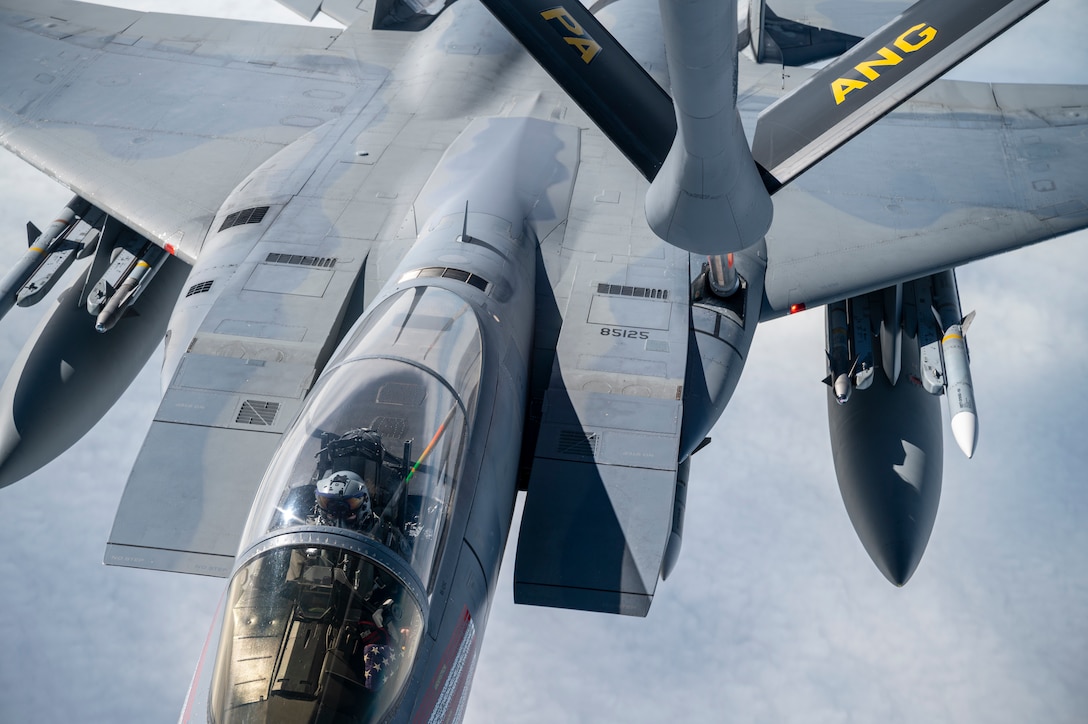 Under the direction of the North American Aerospace Defense Command (NORAD), an F-15 assigned to the Massachusetts Air National Guard conducts air-to-air refueling from a KC-135 assigned to the Pennsylvania Air National Guard during air-defense Operation NOBLE DEFENDER, Oct. 27, 2022.