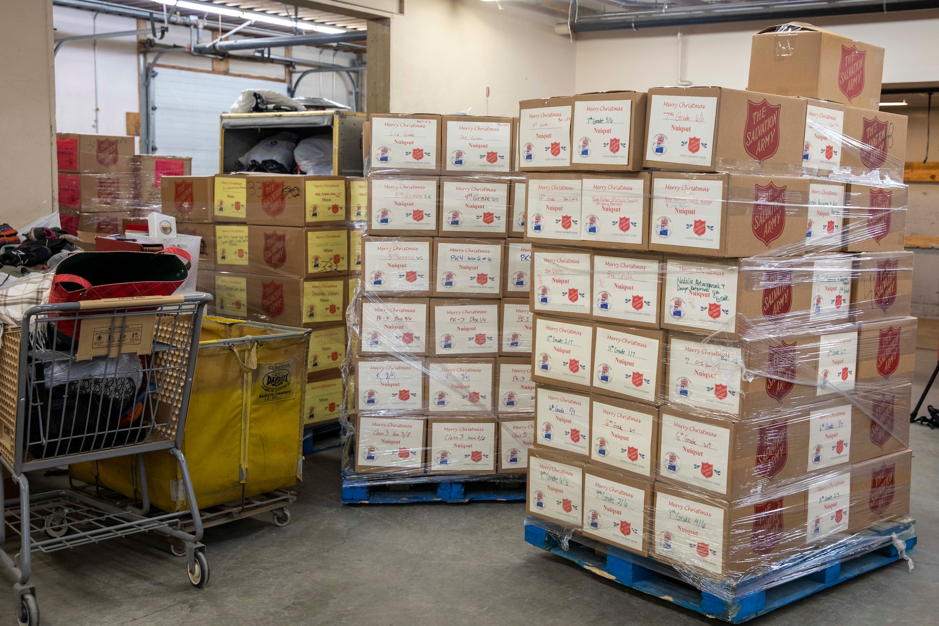 Gifts packaged for children in remote communities across Alaska are staged at the Salvation Army warehouse in Anchorage, Nov. 10, 2022, before transportation by the 176th Logistics Readiness Squadron to Joint Base Elmendorf-Richardson. Operation Santa Claus is the AKNG’s yearly community relations and support program that provides gifts to children in communities across the state. In its 67th year, the program will celebrate with the communities of Scammon Bay, Minto and Nuiqsuit. (Alaska National Guard photo by Staff Sgt. Katie Mazos-Vega)