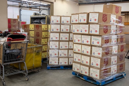 Gifts packaged for children in remote communities across Alaska are staged at the Salvation Army warehouse in Anchorage, Nov. 10, 2022, before transportation by the 176th Logistics Readiness Squadron to Joint Base Elmendorf-Richardson. Operation Santa Claus is the AKNG’s yearly community relations and support program that provides gifts to children in communities across the state. In its 67th year, the program will celebrate with the communities of Scammon Bay, Minto and Nuiqsuit. (Alaska National Guard photo by Staff Sgt. Katie Mazos-Vega)