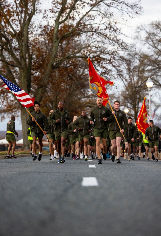 U.S. Marine Corps Col. Michael L. Brooks, base commander, Marine Corps Base Quantico, and Sgt. Maj. Collin D. Barry, sergeant major, MCBQ, lead Marines in a motivational run in honor of the Marine Corps’ 247th birthday on MCBQ, Virginia, Nov. 10, 2022. Each year, Marines come together to celebrate the Marine Corps birthday with ceremonies that recall the history of the Corps and enhance the camaraderie shared across generations of Marines. (U.S. Marine Corps photo by Cpl. Eric Huynh)