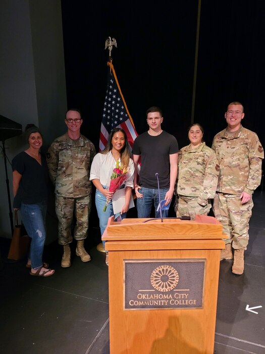Group of people by podium