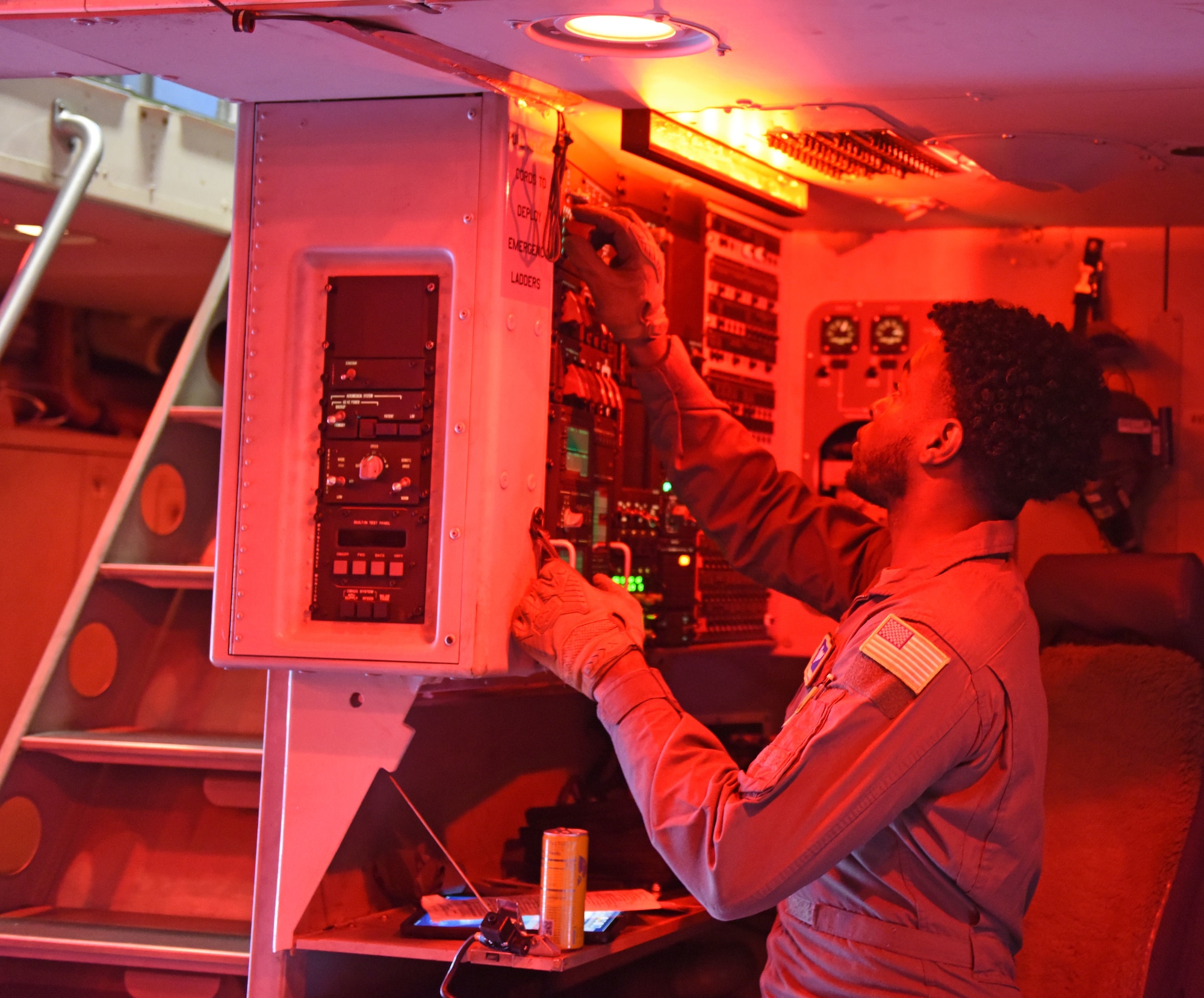 U.S. Air Force Senior Airman Will Poindexter, a loadmaster with the 7th Airlift Squadron, performs preflight procedures on a C-17 Globemaster III during Exercise RED FLAG-Alaska 23-1 at Joint Base Elmendorf-Richardson, Alaska, Oct. 19, 2022.