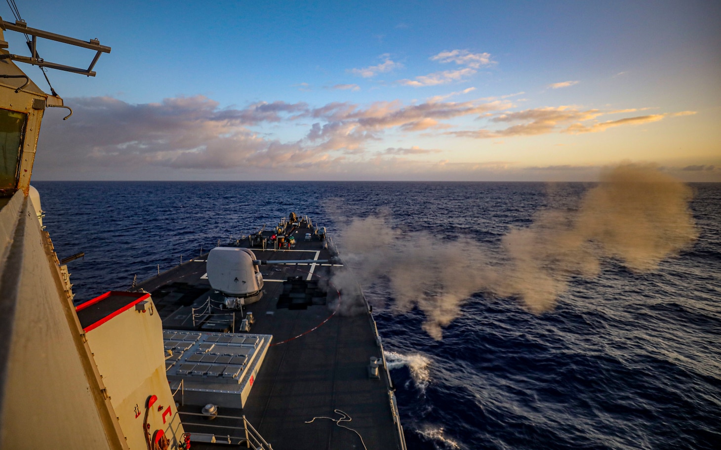 PHILIPPINE SEA (Nov. 13, 2022) Arleigh Burke-class guided-missile destroyer USS Benfold (DDG 65) conducts a 5-inch live-fire gunnery exercise, part of Keen Sword in the Philippine Sea, Nov. 13. Keen Sword is a biennial, joint and bilateral field-training exercise involving U.S. military and Japan Self-Defense Force personnel, designed to increase readiness and interoperability while strengthening the ironclad Japan-U.S. alliance. (U.S. Navy photo by Mass Communication Specialist 2nd Class Arthur Rosen)