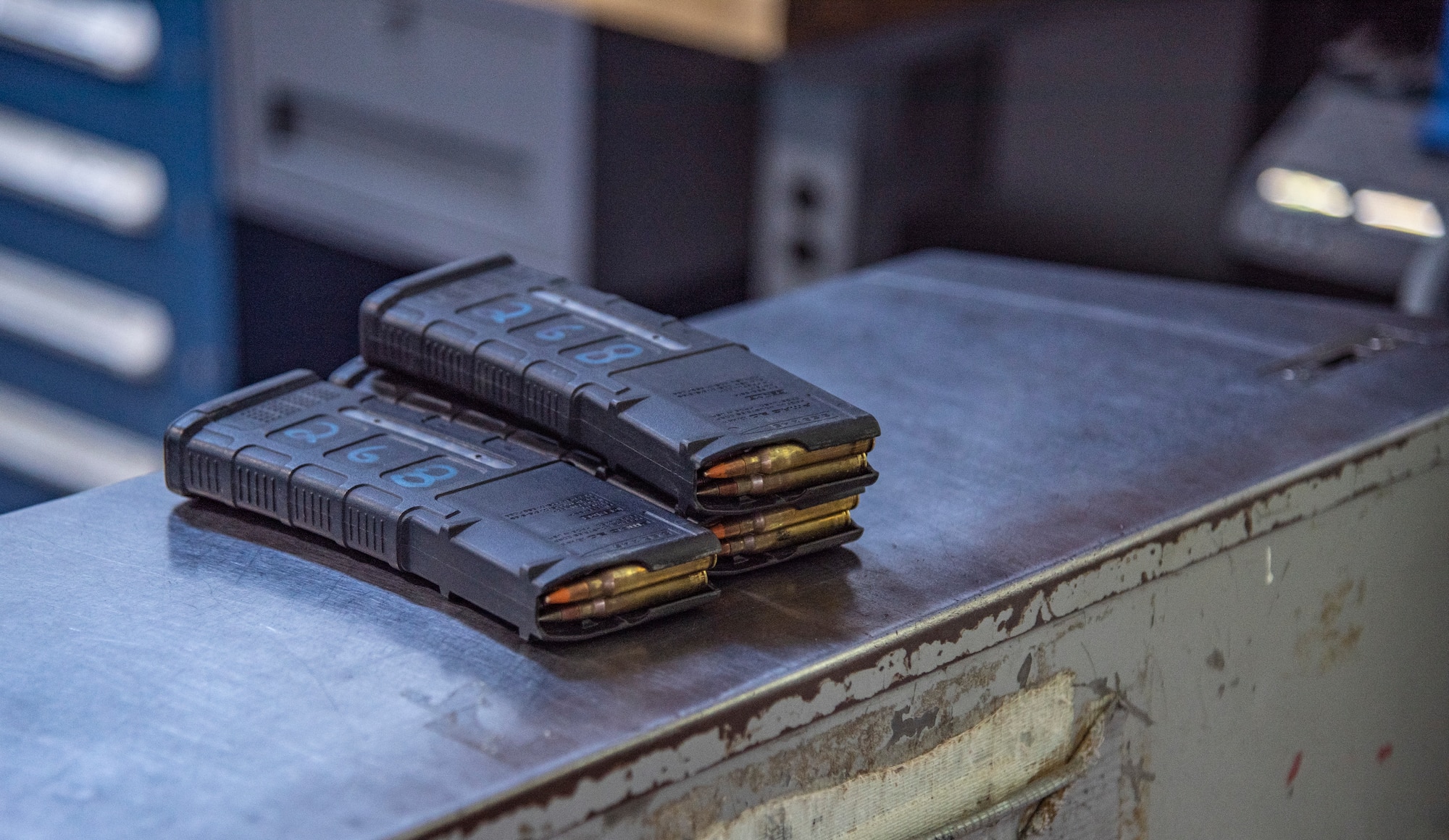 Three 30-round NATO magazines for use with an M4A1 carbine at the 332d Expeditionary Security Forces Squadron Armory at an undisclosed location, Southwest Asia, Oct. 31, 2022. The 332d ESFS Armory provides all lethal and nonlethal weaponry used by Security Forces in base protection and combat operations. (U.S. Air Force photo by: Tech. Sgt. Jim Bentley)
