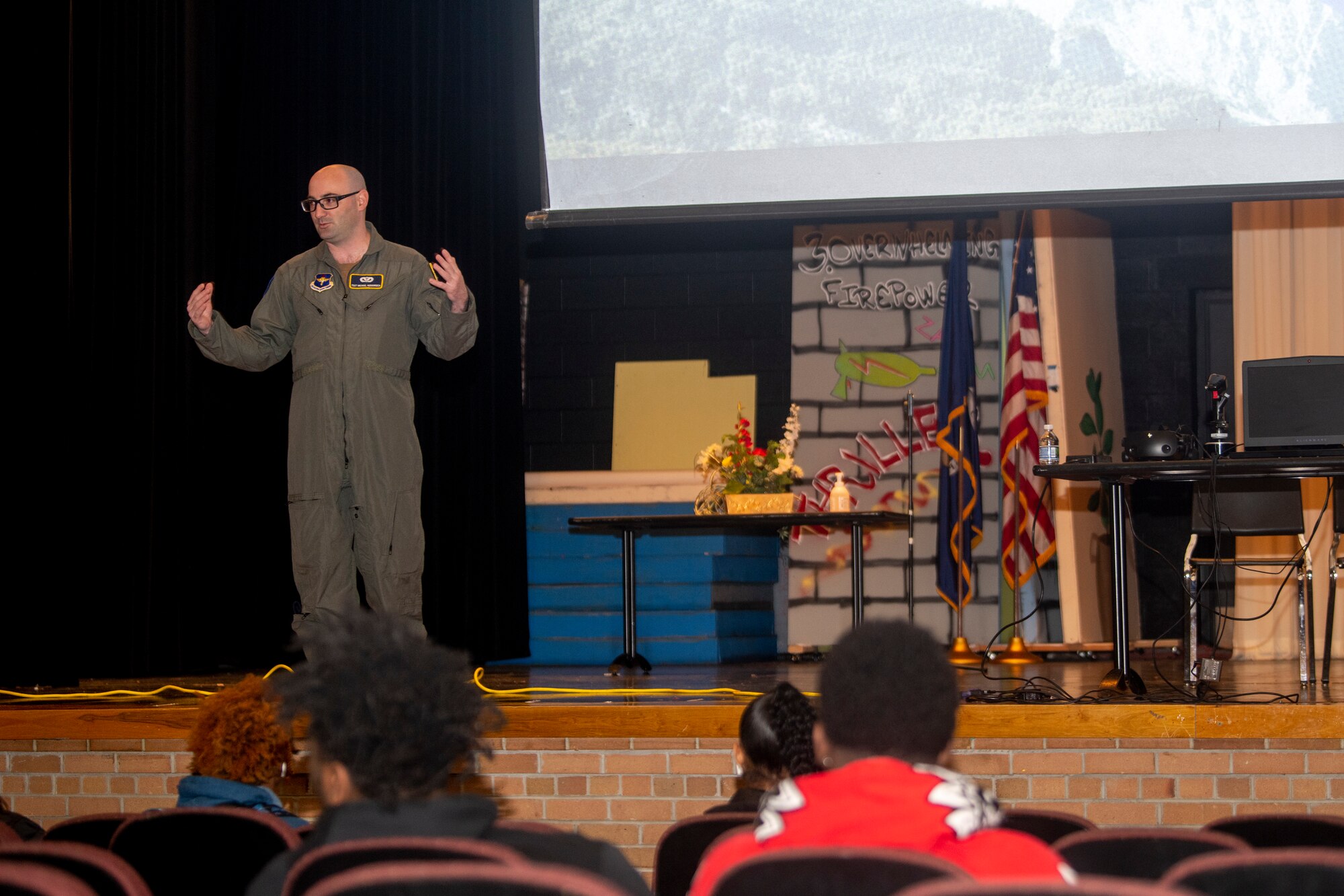 Air Force member speaks with students about the Aim High Flight Academy at Oak Park High School, Oak Park, Michigan