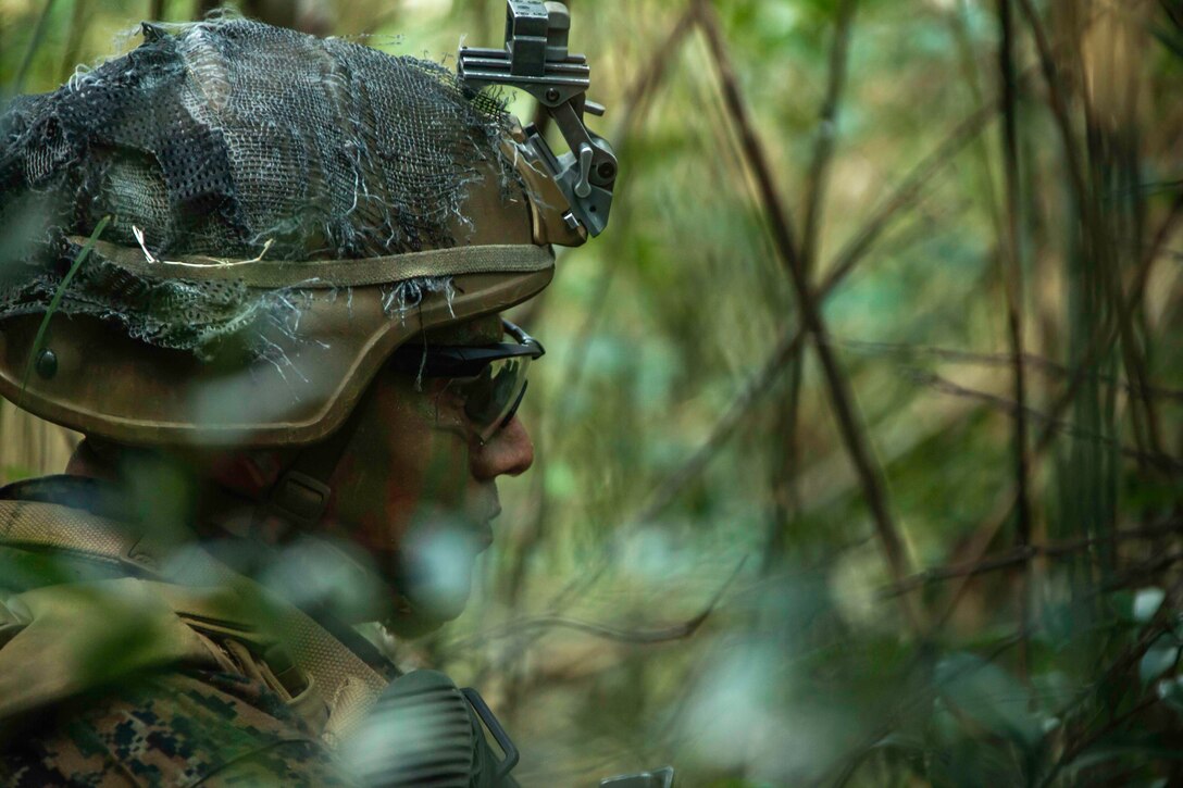 U.S. Marine Corps Lance Cpl. Adam Castro, a rifleman assigned to 2d Battalion, 3d Marines, 3d Marine Division, conducts Indo-Pacific Warfighting Exercise in the Northern Training Area on Okinawa, Japan, August 31, 2021. This force-on-force exercise demonstrated the ability to seize and defend key-maritime terrain and provided an opportunity to employ techniques to rapidly establish forward arming and refueling points. 2/3 is currently attached to 4th Marines as a part of the Unit Deployment Program. Castro is a native of Santa Paula, California. (U.S. Marine Corps photo by Lance Cpl. Scott Aubuchon)