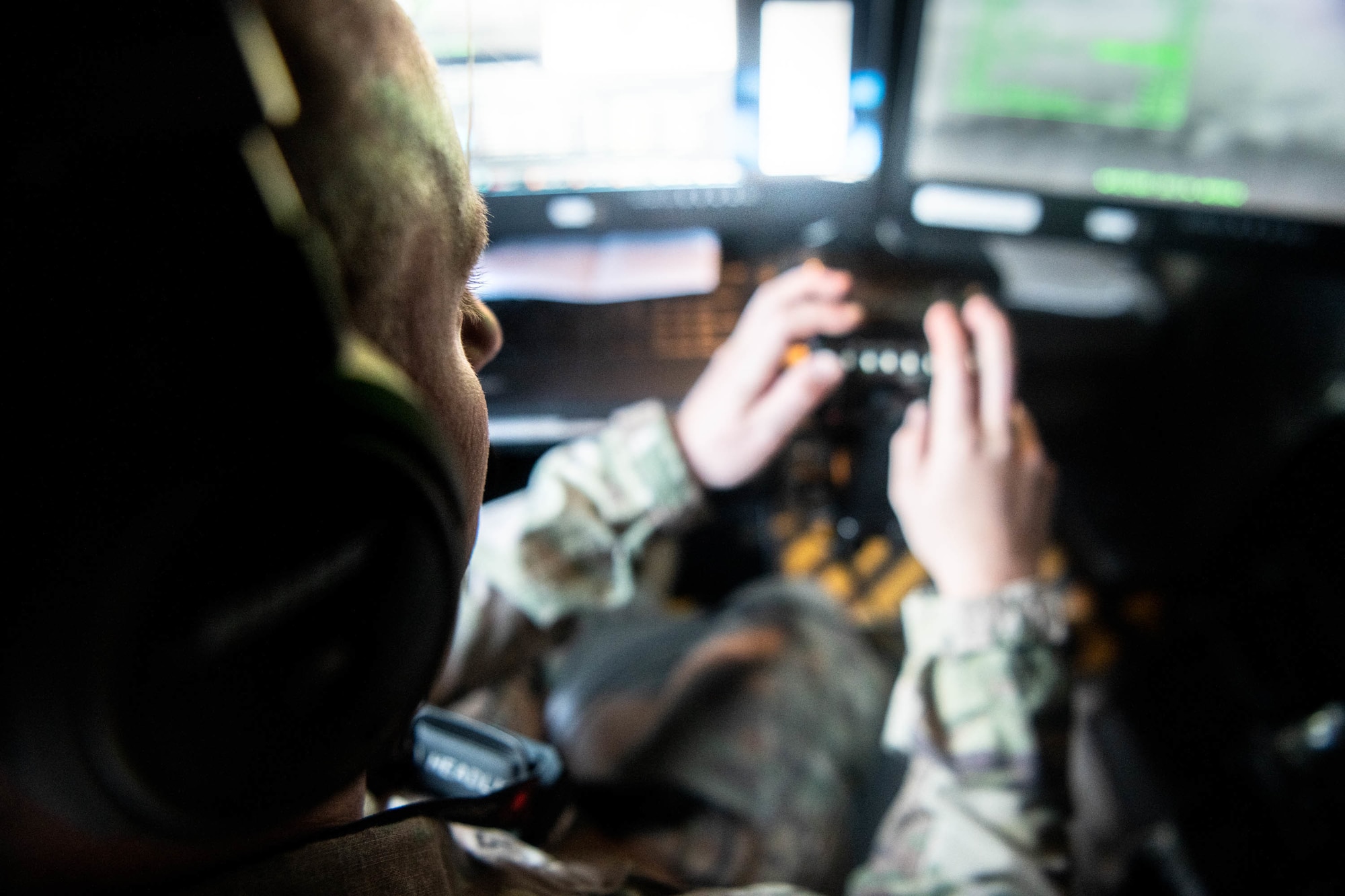 A U.S. Air Force combat systems officer conducts manned ISR operations