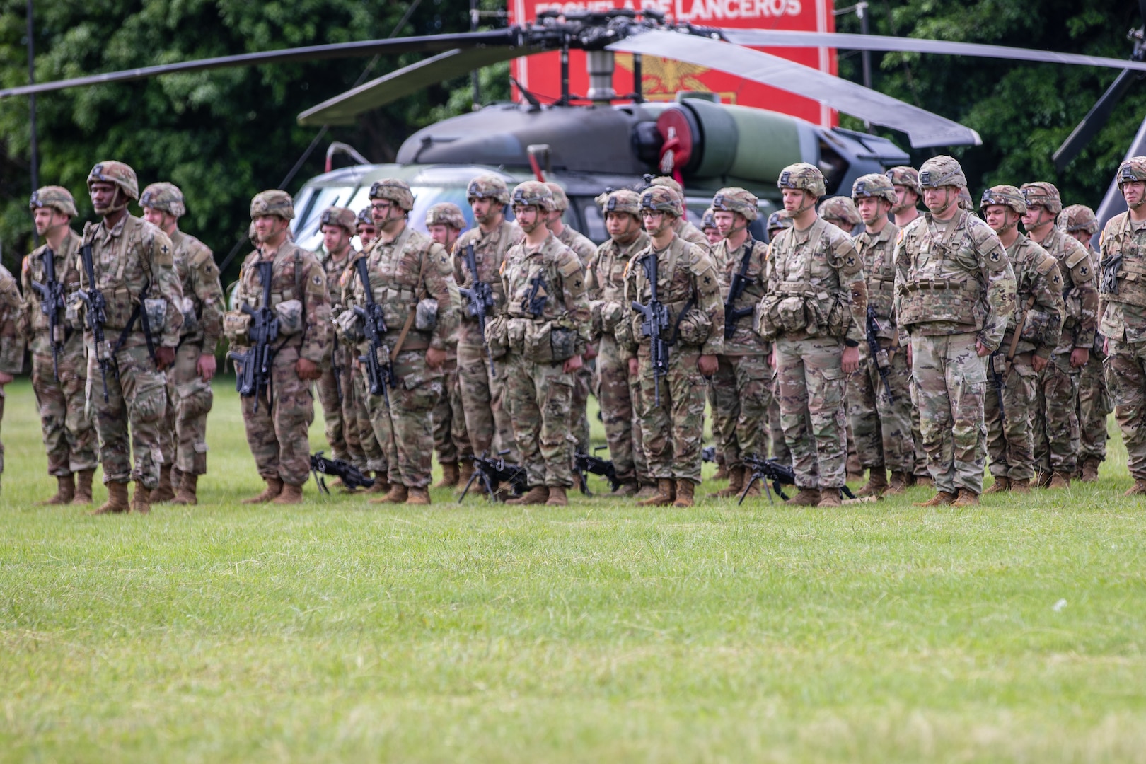 Soldiers from the Illinois Army National Guard stand in formation during the opening ceremony of Exercise Southern Vanguard 23 at Tolemaida Military Base, Colombia, Nov. 8, 2022.