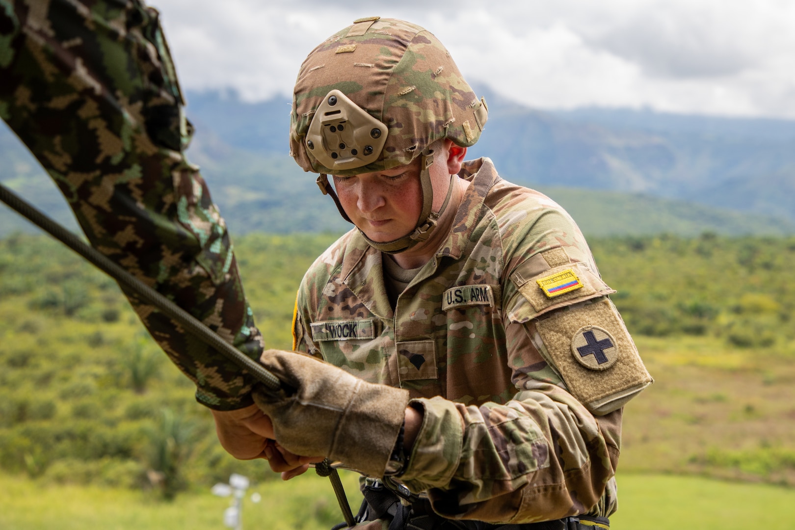 Spc. Garrett Wock, of Jerseyville, Illinois, assigned to the Effingham-based Bravo Company, 2nd Battalion, 130th Infantry Regiment, 33rd Infantry Brigade Combat Team, Illinois Army National Guard take part in basic rappelling training hosted by members of the Colombian Army Air Assault School during Exercise Southern Vanguard 23 on Nov. 6, 2022 at Tolemaida Military Base, Colombia.