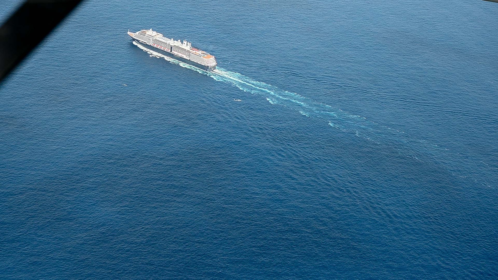 Pictured above is a ship sailing through the ocean.