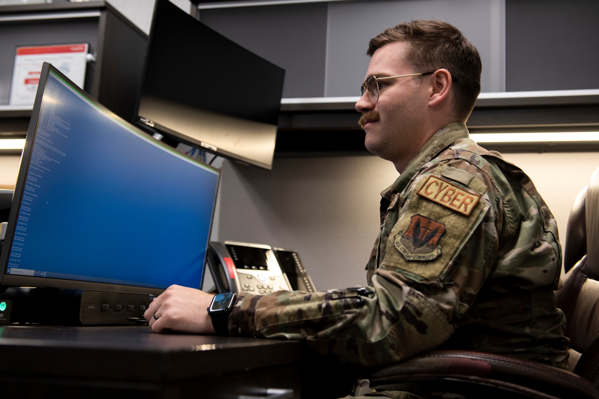 U.S. Air Force Senior Airman Thomas Eldredge, 325th Communications Squadron cyber systems operations journeyman, monitors network systems at Tyndall Air Force Base, Florida, Oct. 27, 2022.