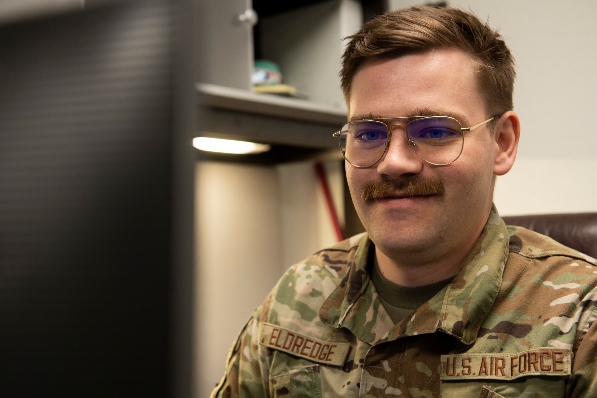 U.S. Air Force Senior Airman Thomas Eldredge, 325th Communications Squadron cyber systems operations journeyman, monitors computer network systems at Tyndall Air Force Base, Florida, Oct. 27, 2022.