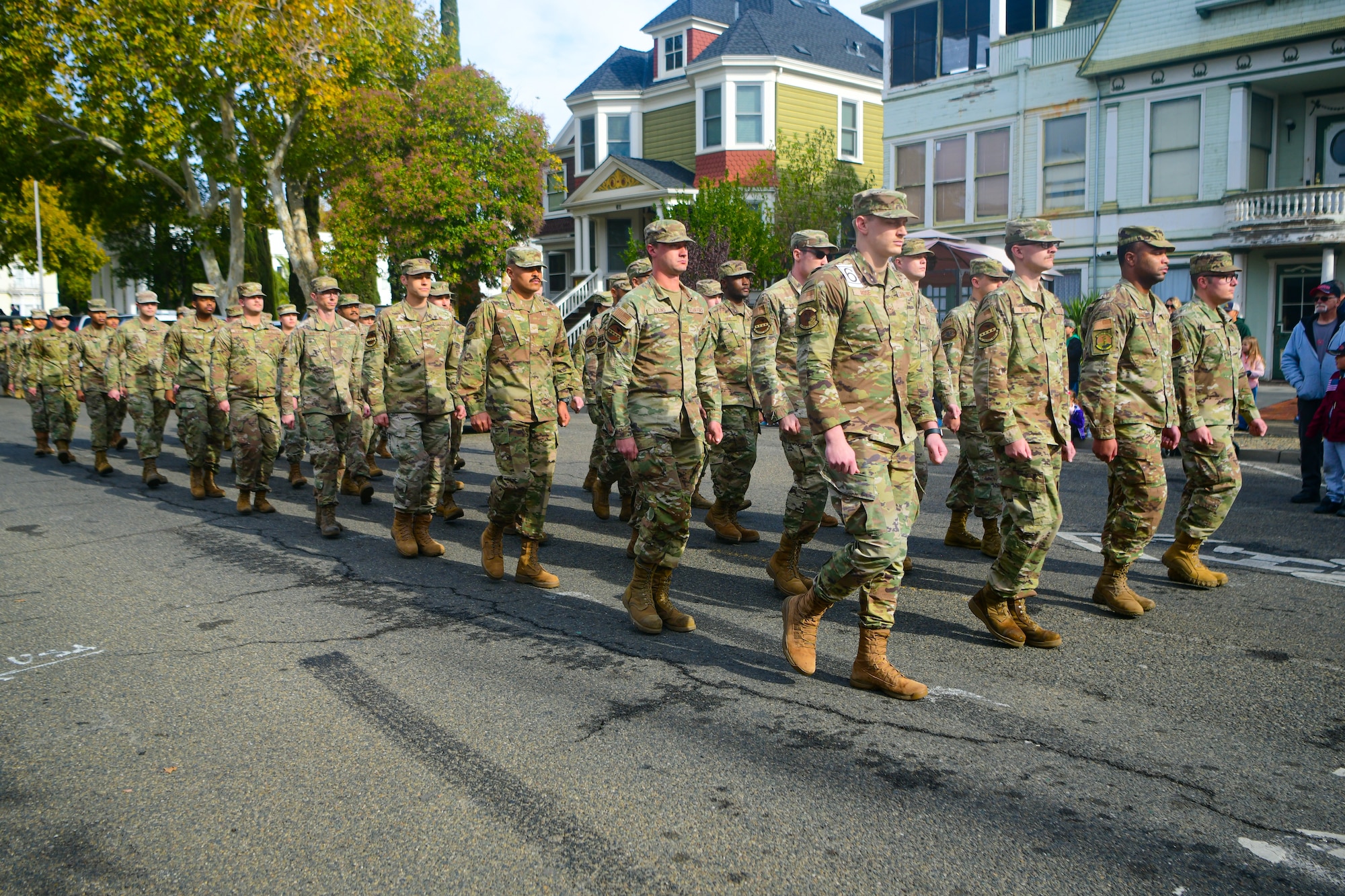 Members from Beale Air Force Base march in a Veterans Day parade in Marysville, Calif., on Nov. 11, 2022.