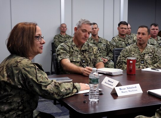 Vice Chief of Naval Operations Adm. Lisa M. Franchetti talks with major commanders, deputy commanders and senior enlisted personnel, including Capt. John Stafford, commander of Submarine Squadron 4, and Capt. Eric Sager, commanding officer of the Naval Submarine School, during a meeting at the Undersea Warfighting Development Center (UWDC) on Wednesday, Nov. 16, 2022.