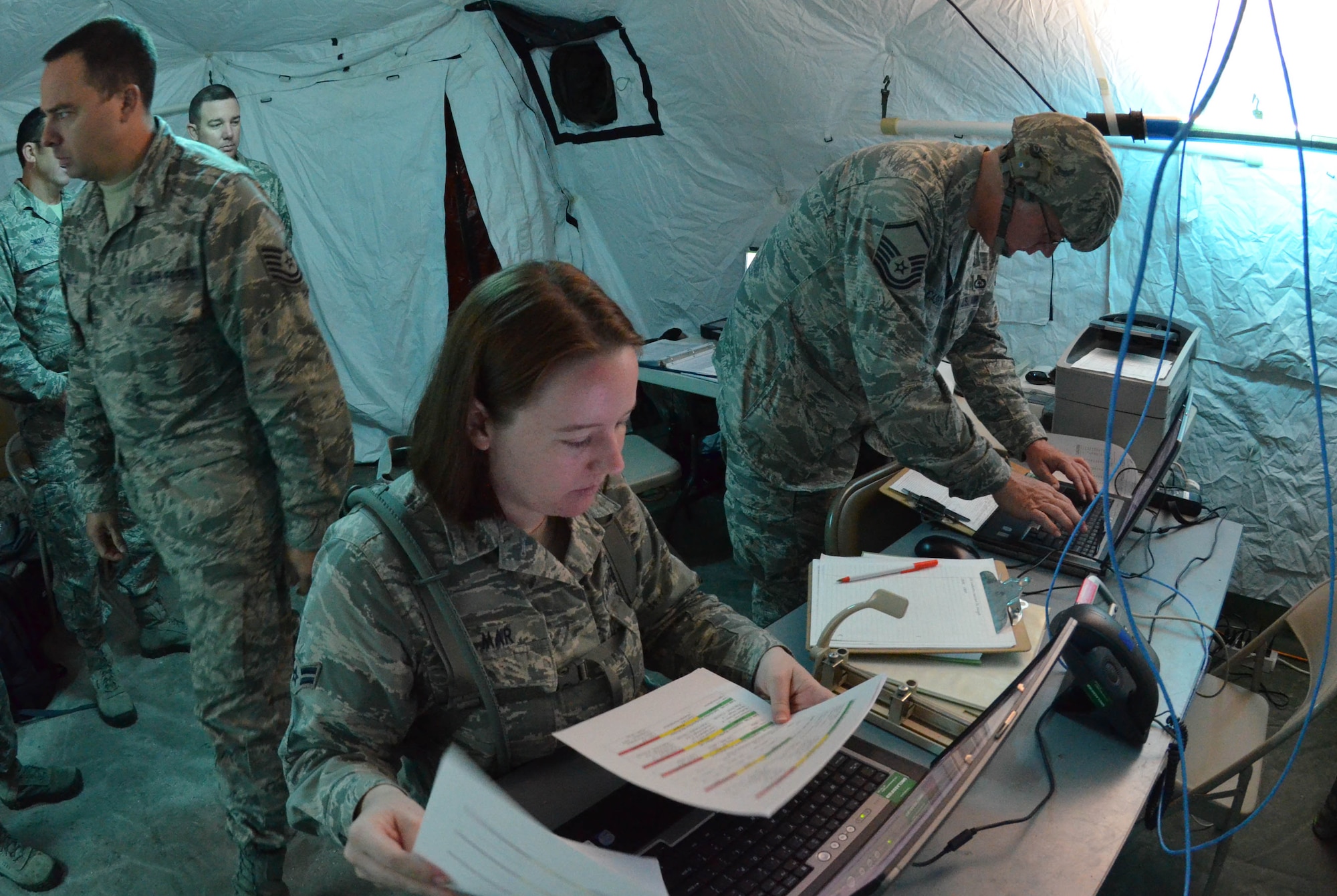 Airmen from the Florida Air National Guard's 159th Weather Flight take part in a training exercise at Camp Blanding Joint Training Center, Oct. 4, 2014. Airmen assigned to the 159th Weather Flight won Thor’s Forecast Challenge weather forecasting competition in 2021 and 2022.