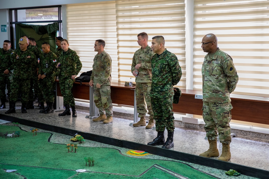 Brig. Gen. Rodney Boyd, Assistant Adjutant General -Army and Commander of the Illinois Army National Guard, and Colombian Army Brig. Gen. Hernando Garzon Rey, U.S. Army South Deputy Commanding General - Interoperability, receive an operations brief of Exercise Southern Vanguard 23 on Nov. 8, 2022 at Tolemaida Military Base, Colombia.