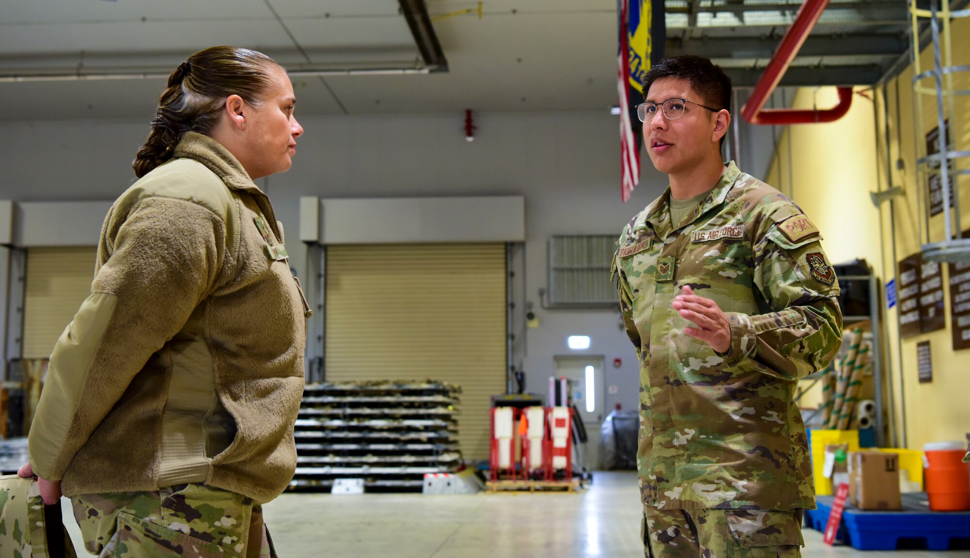 U.S. Air Force Maj. Gen. Linda Hurry, director of logistics for the Deputy Chief of Staff for logistics, engineering and force protection, discusses workplace processes with Airmen from the 31st Logistics Readiness Squadron at Aviano Air Base, Italy, Nov. 9, 2022. Hurry learned how Aviano AB Airmen are creating improved processes that challenge the status quo and increase productivity across the logistics field. (U.S. Air Force photo by Natalie Stanley)