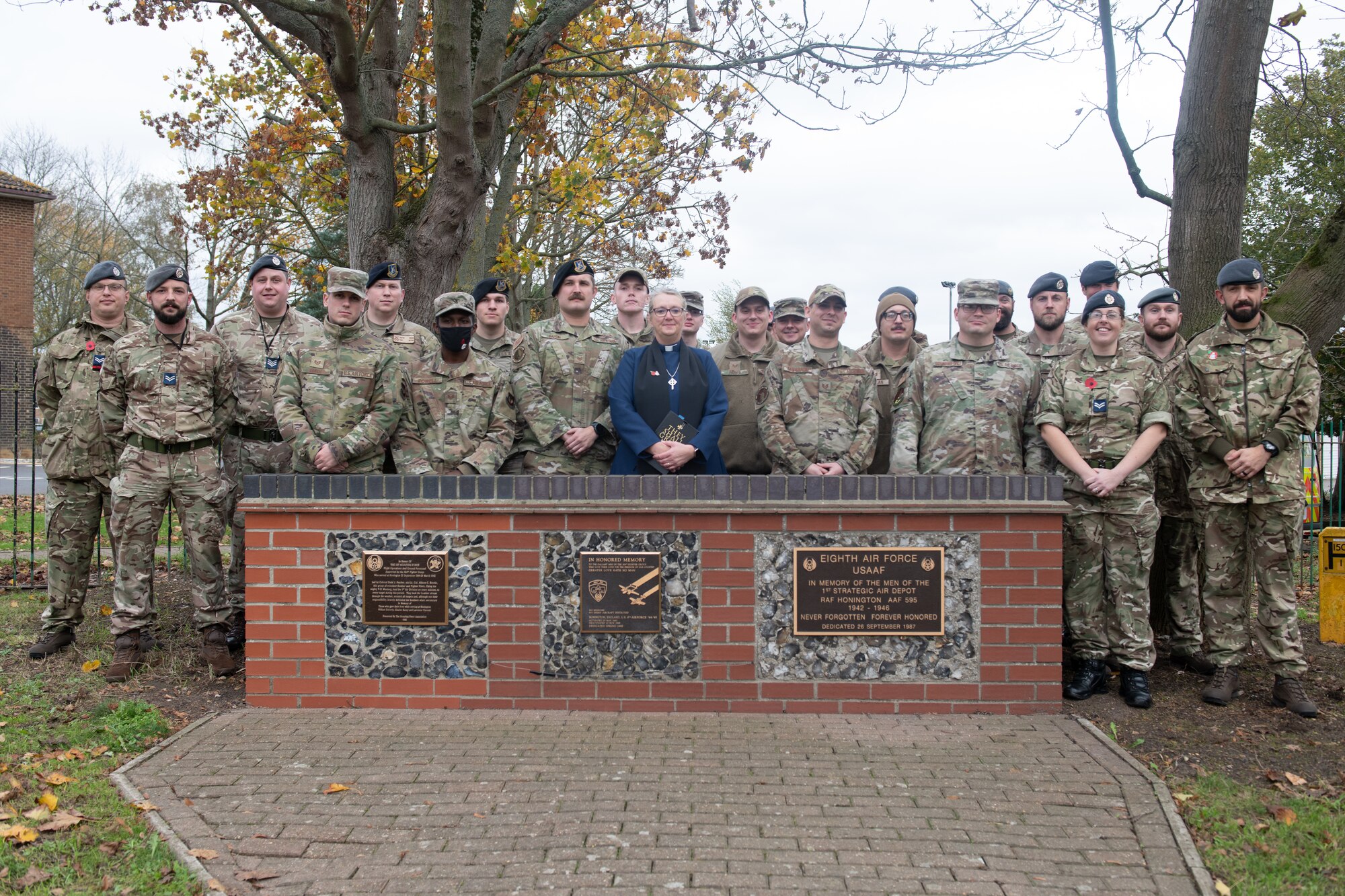 U.S and Royal Air Force personnel pose for a photo on RAF Honington, England, Nov. 10, 2022.