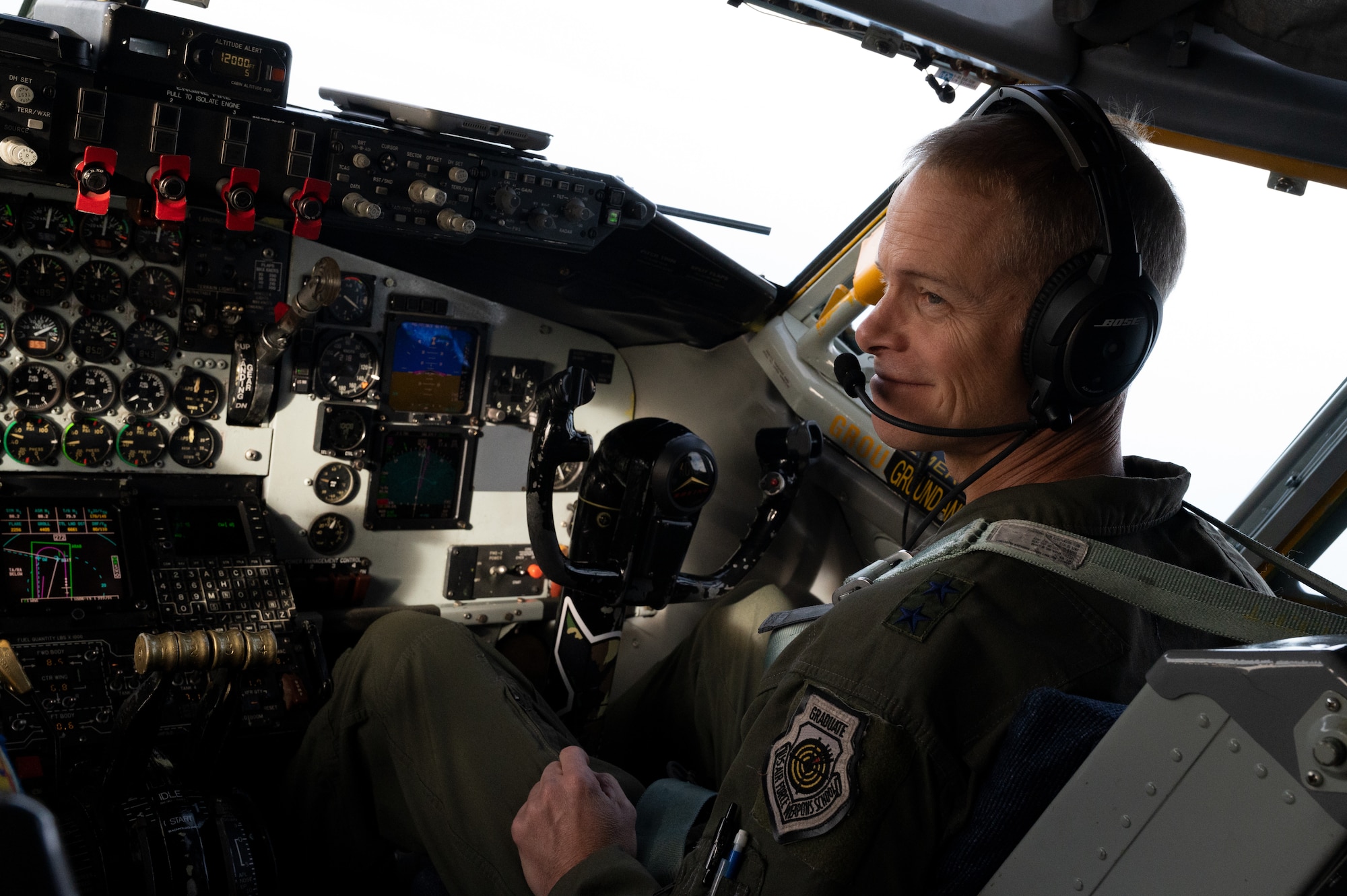 U.S. Air Force Maj. Gen. Derek France, Third Air Force commander, sits on the left seat of a KC-135 Stratotanker Aircraft at Royal Air Force Mildenhall, England, Nov. 10, 2022. The KC-135 Stratotanker provided aerial refueling over the North Sea to five F-35 Lightning II Aircraft assigned to RAF Lakenheath. (U.S. Air Force photo by Airman 1st Class Viviam Chiu)