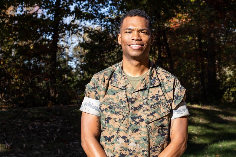 U.S. Marine Corps Capt. Richmond Jackson, an information system security manager for the Marine Corps Recruiting Command, poses for a portrait at the James Wesley Marsh Center, Marine Corps Base Quantico, Va. Oct. 18. 2022. With no support on his education while growing up, Jackson defied all odds and created a successful career within the Marine Corps. (Marine Corps photo by Lance Cpl. Jennifer Sanchez)