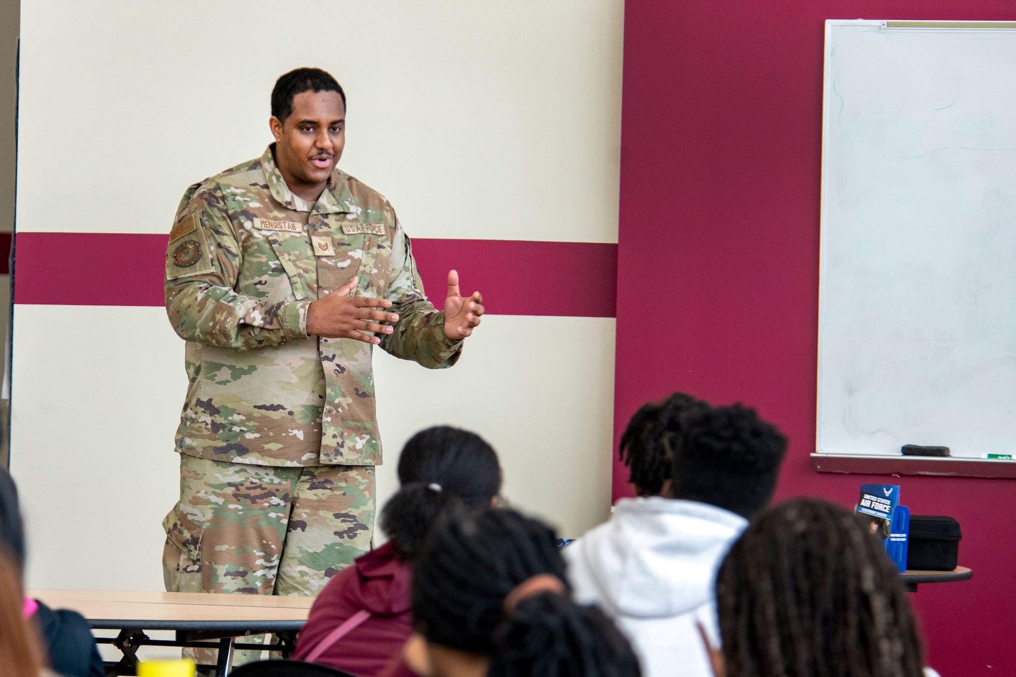 An Air Force recruiter takes questions from students during a presentation at Renaissance High School, Detroit.