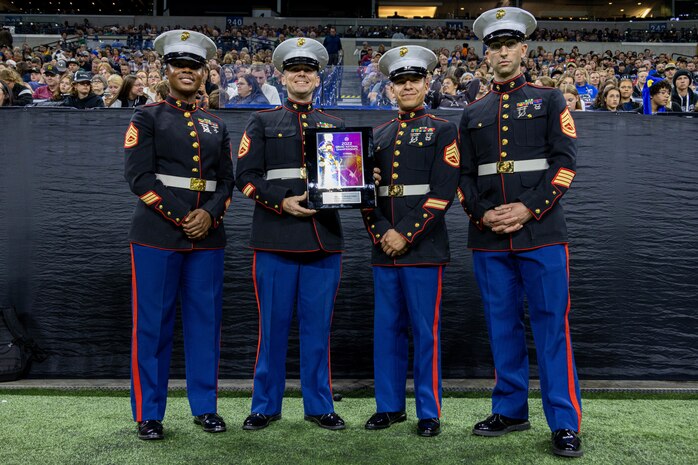 U.S. Marines awarded the Sponsorship Recognition Award at the Bands of America Grand National Championships on Lucas Oil Stadium, Indianapolis, Ind., Nov. 11, 2022. Marine Corps Recruiting Command is proud to partner with Music for All, this partnership helps increase awareness of the Marine Corps’ opportunities and connect with band directors, influencers and students.