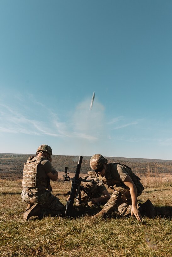 U.S. Soldiers with the 1-110th Infantry Battalion, 2nd Infantry Brigade Combat Team, 28th Infantry Division fire a mortar system during an exercise at Fort Indiantown Gap.