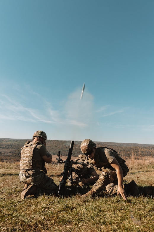 U.S. Soldiers with the 1-110th Infantry Battalion, 2nd Infantry Brigade Combat Team, 28th Infantry Division fire a mortar system during an exercise at Fort Indiantown Gap.