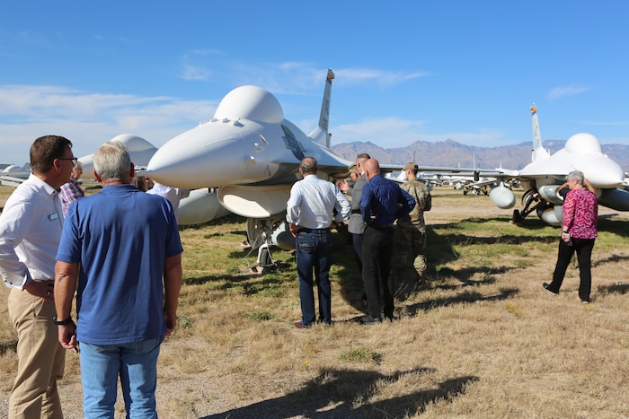 Air Force Materiel Command Civic Leaders view an aircraft that is in the preservation process in the desert storage.
